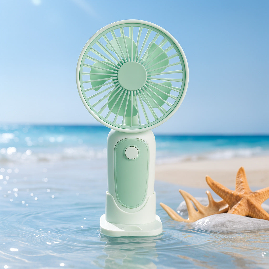 Unisex compact portable hand fan with foldable stand and quiet brushless motor rechargeable