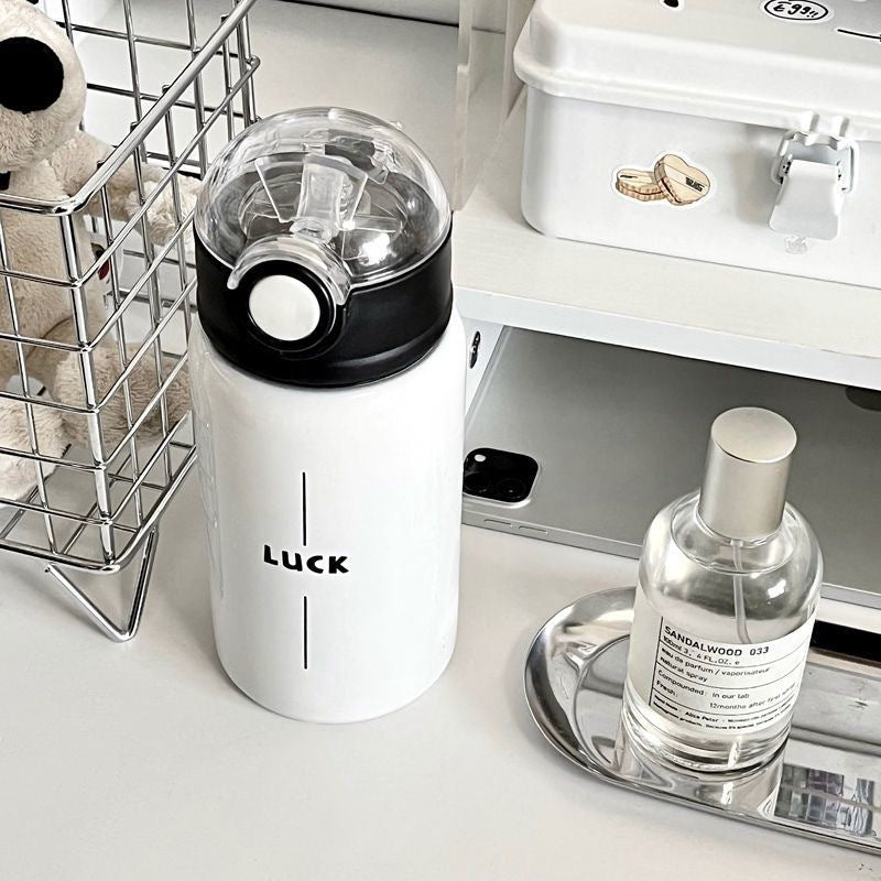 Women's Insulated Water Bottle with Flip Lid and Handle BPA-Free Eco-Friendly Design