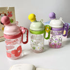 Women's BPA-Free Plastic Water Bottle with Leak-Proof Silicone Lid and Floral Design