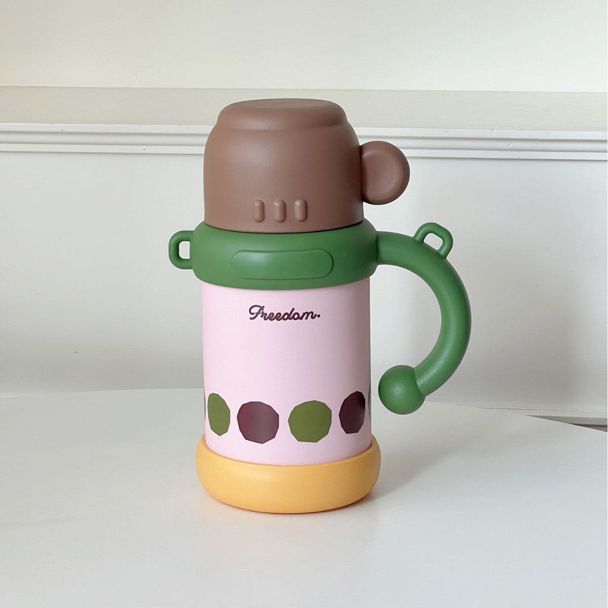 Women’s BPA-Free Plastic Water Bottle with Carry Handle and Integrated Straw Floral Design