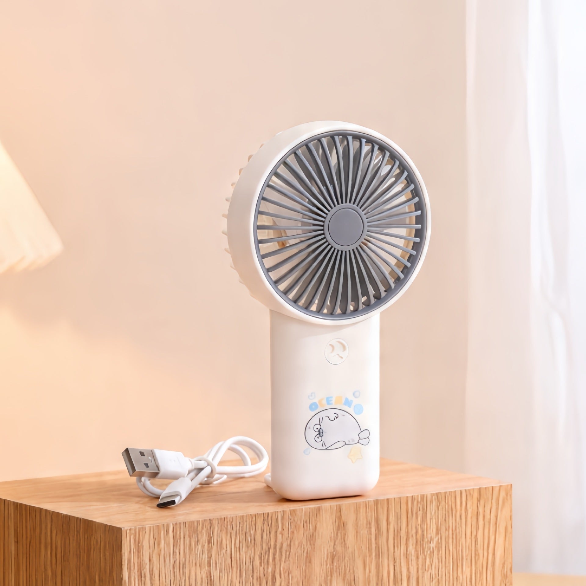 Portable USB Fan Compact Quiet Operation Multiple Speeds Cute Penguin Design for Travel and Office Use