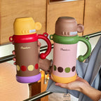 Women’s BPA-Free Plastic Water Bottle with Carry Handle and Integrated Straw Floral Design