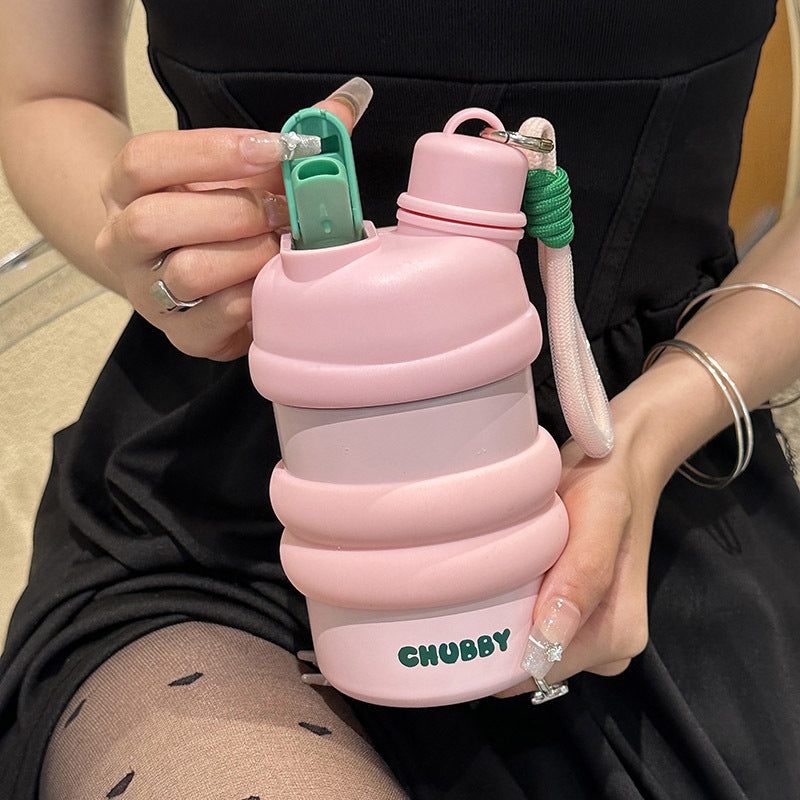 Women’s BPA-Free Plastic Water Bottle with Non-Slip Grip and Carry Loop Multifunctional Hydration Bottle