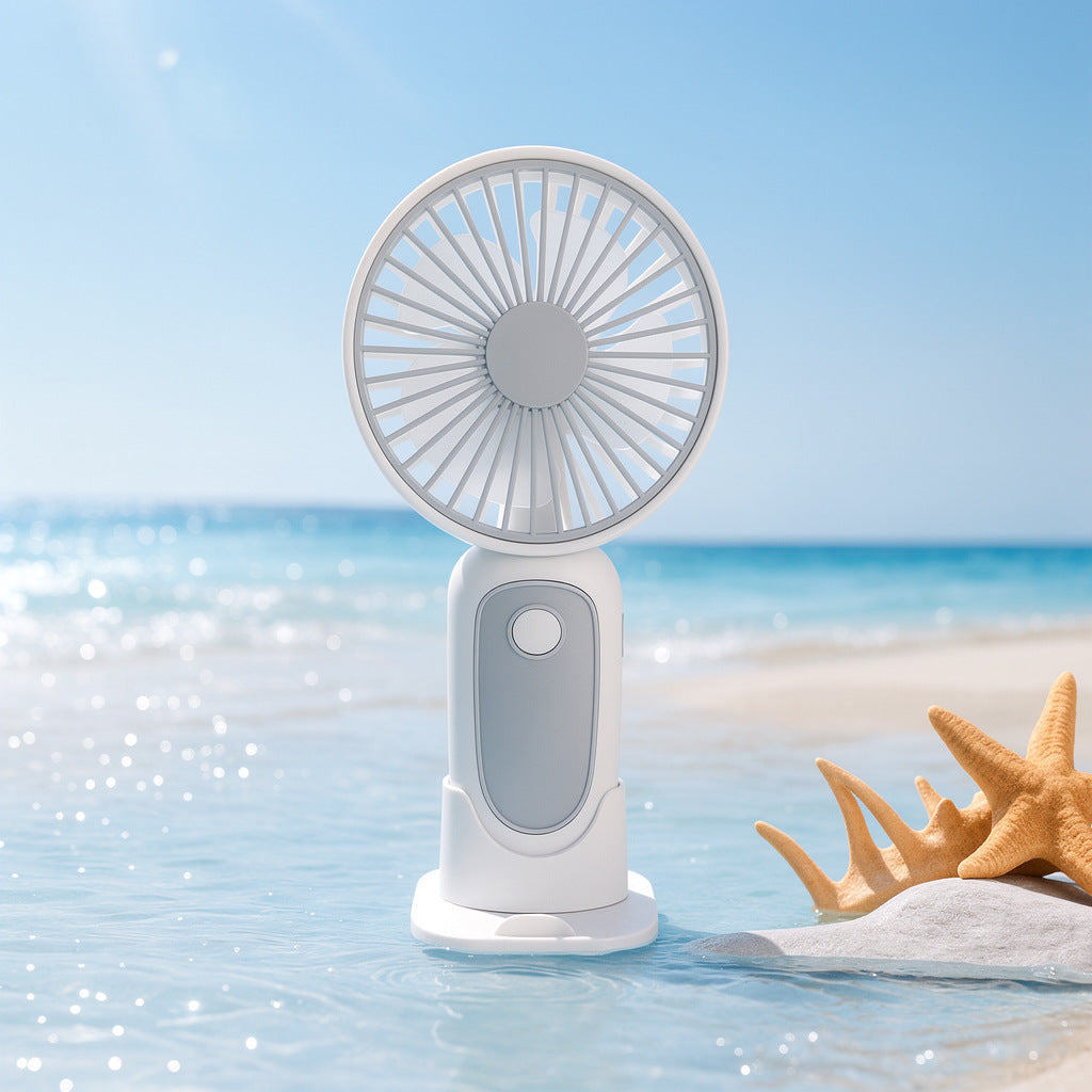 Unisex compact portable hand fan with foldable stand and quiet brushless motor rechargeable