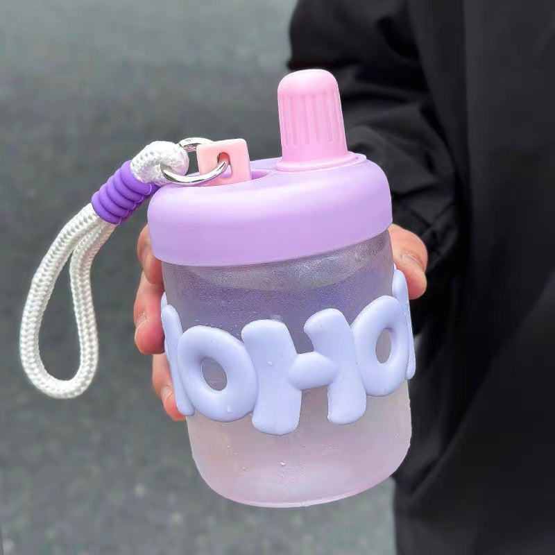 Women’s BPA-Free Plastic Water Bottle with Integrated Carrying Loop and Screw Cap Splash Guard