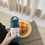 Insulated Stainless Steel Water Bottle with Ergonomic Carry Handle for Women