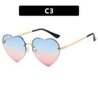 Women’s Heart-Shaped Sunglasses with Mirrored Lenses and Metal Frame UV Protection
