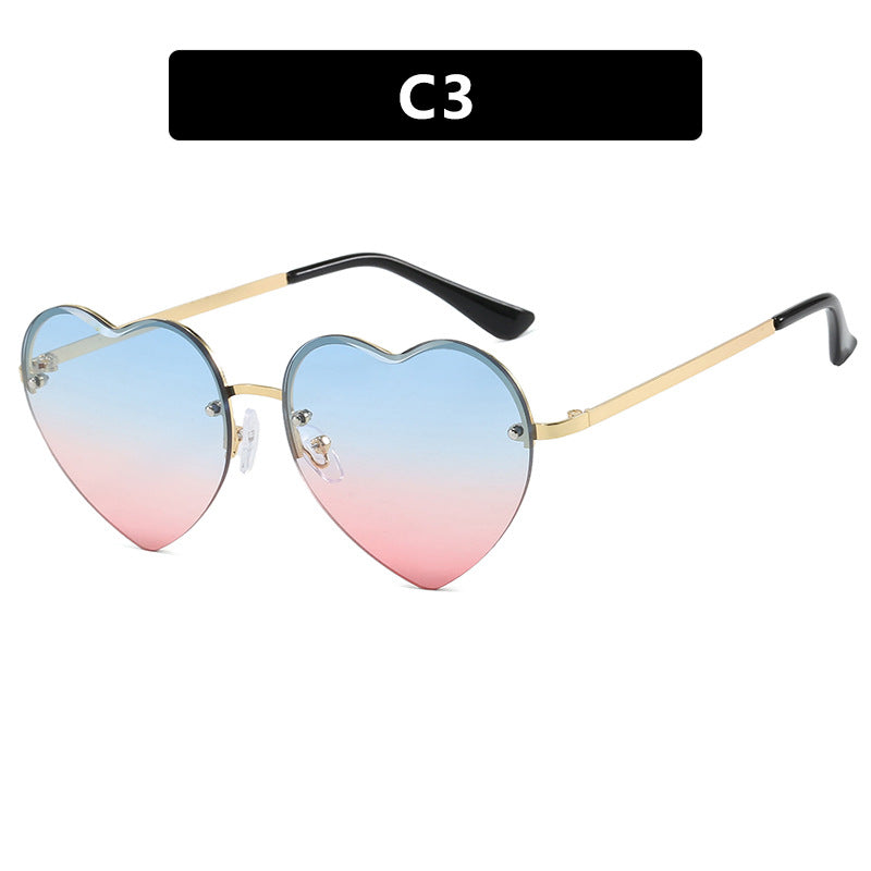 Women’s Heart-Shaped Sunglasses with Mirrored Lenses and Metal Frame UV Protection