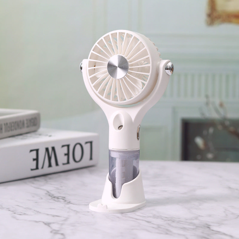 Portable Handheld Fan with Integrated Misting Function Adjustable Speed Settings