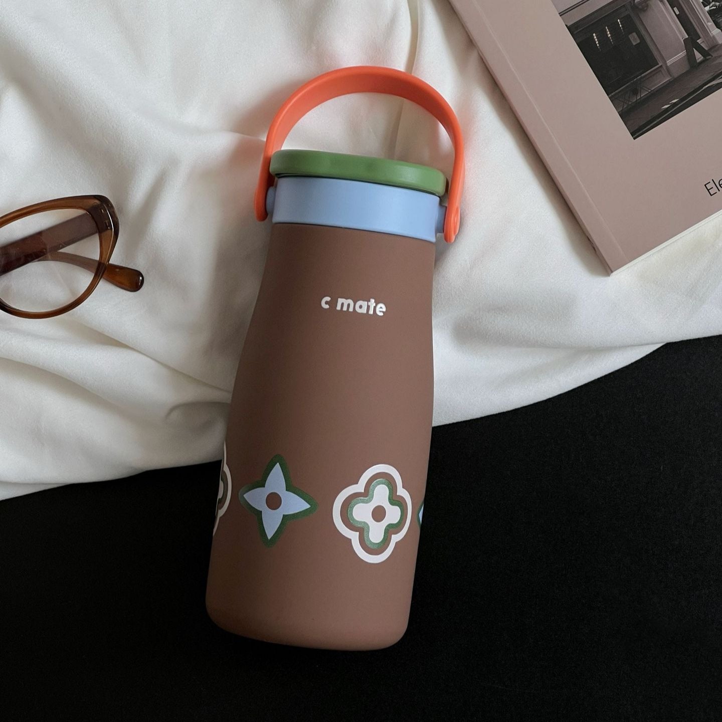 Women’s Ergonomic BPA-Free Plastic Water Bottle with Carrying Handle and Floral Design