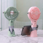 Portable Handheld Fan with Integrated Misting Function Adjustable Speed Settings