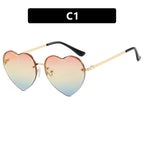 Women’s Heart-Shaped Sunglasses with Mirrored Lenses and Metal Frame UV Protection