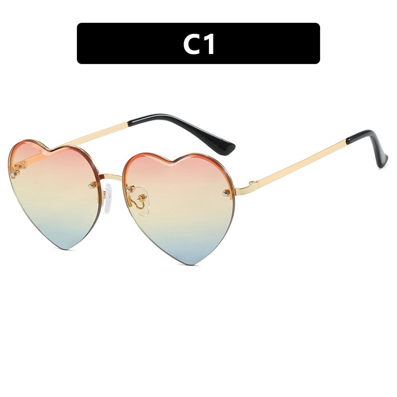 Women’s Heart-Shaped Sunglasses with Mirrored Lenses and Metal Frame UV Protection