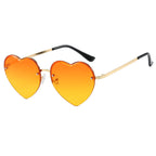 Women’s Heart-Shaped Sunglasses with Mirrored Lenses and Metal Frame UV Protection