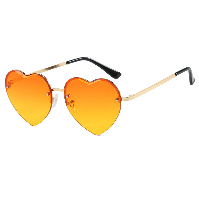 Women’s Heart-Shaped Sunglasses with Mirrored Lenses and Metal Frame UV Protection