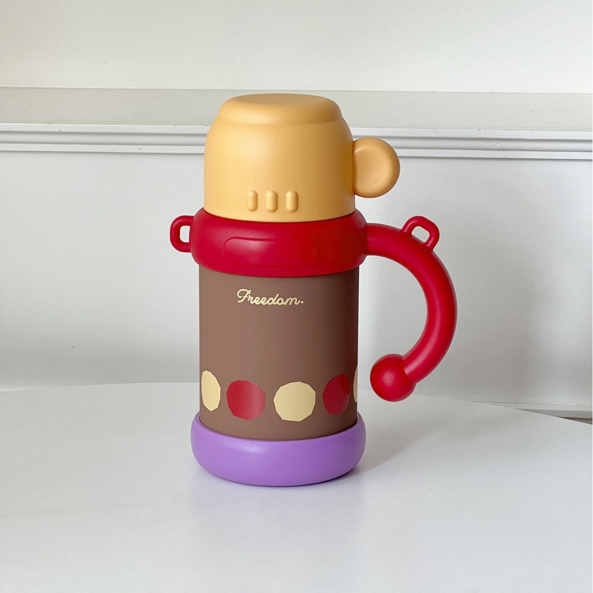 Women’s BPA-Free Plastic Water Bottle with Carry Handle and Integrated Straw Floral Design