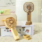 Portable USB Handheld Fan with Ergonomic Grip and Integrated LED Light for Travel and Home Use