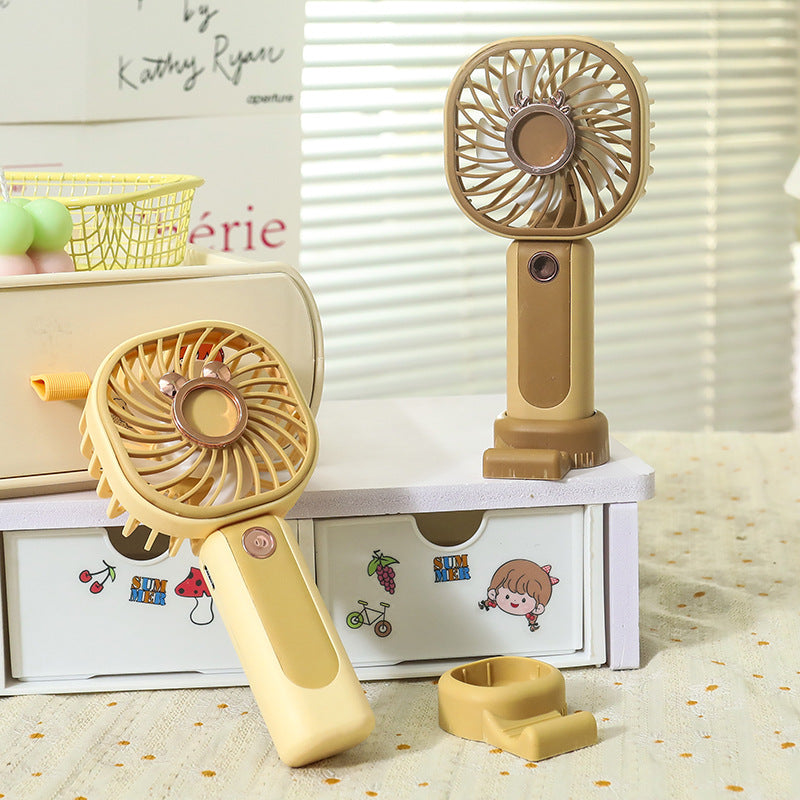 Portable USB Handheld Fan with Ergonomic Grip and Integrated LED Light for Travel and Home Use