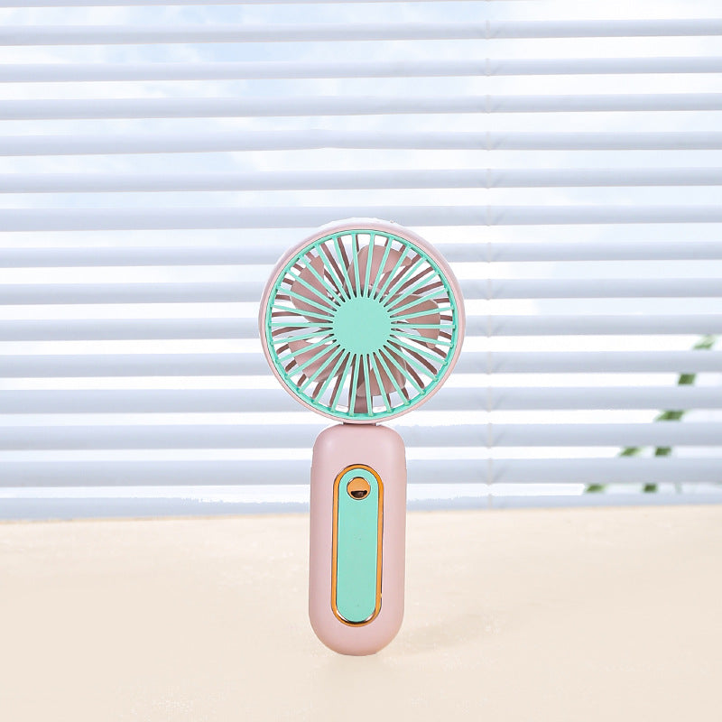 Women's Portable Mini Fan with Ergonomic Handle Rechargeable Battery Compact