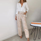 Elegant two-piece co-ord set for women by Harrow featuring a stylish opal-colored top and matching pants.