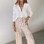 Elegant two-piece co-ord set for women featuring an opal-colored top and matching pants by Harrow.