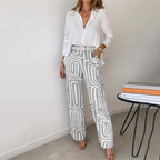 Elegant two-piece co-ord set for women featuring a stylish opal color from Harrow, with a fitted top and matching skirt.