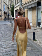 Harrow Alma satin wedding guest maxi dress for women with an open back and elegant design, perfect for formal occasions.