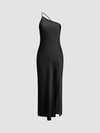 Elegant satin wedding guest maxi dress by Harrow with an open back, designed for women attending formal occasions.