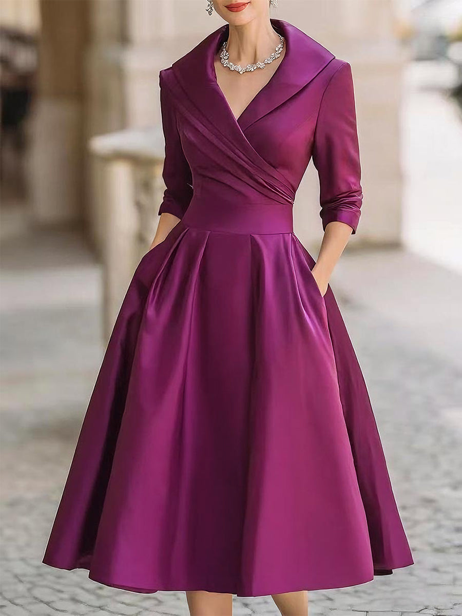Harrow Reece elegant midi dress for women, featuring a flowing summer design with a fitted waist and stylish neckline.