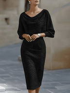 Elegant printed midi dress for women by Harrow, showcasing a luxurious design with a flowing silhouette and stylish pattern.