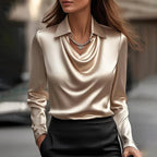 Shannon Harrow women's V-neck casual blouse with shiny fabric, perfect for summer, displayed on a hanger.