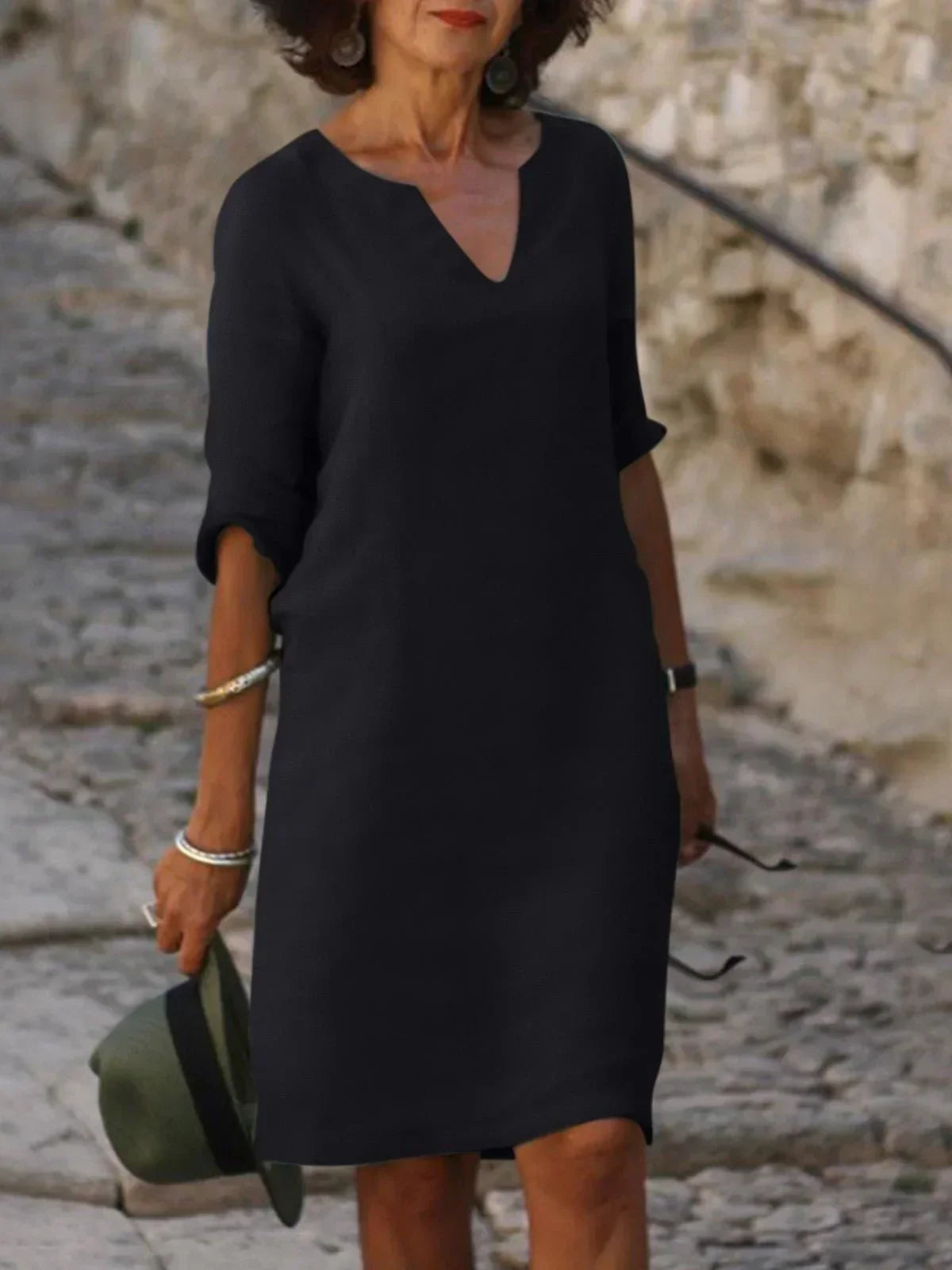 Elegant Skylar V-neck dress for women in summer, featuring lightweight fabric and stylish design by Harrow.