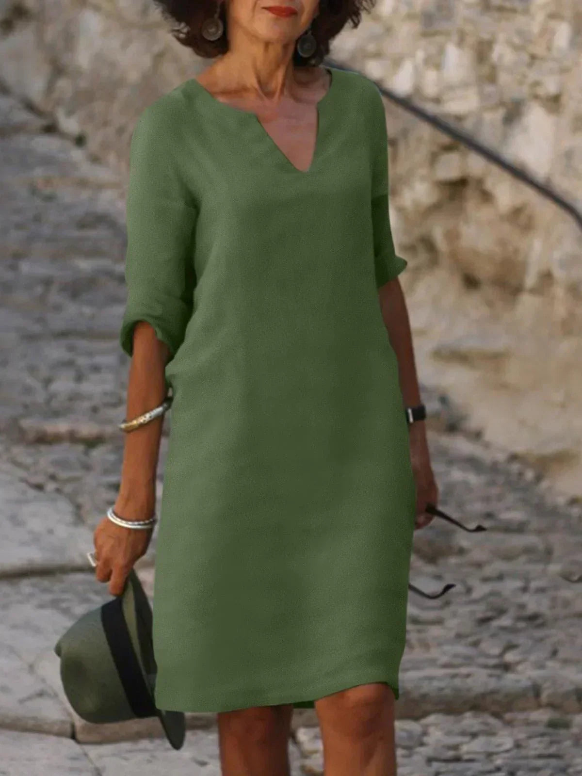 Elegant Skylar V-neck dress for women in summer, featuring lightweight fabric and a flowy silhouette by Harrow.