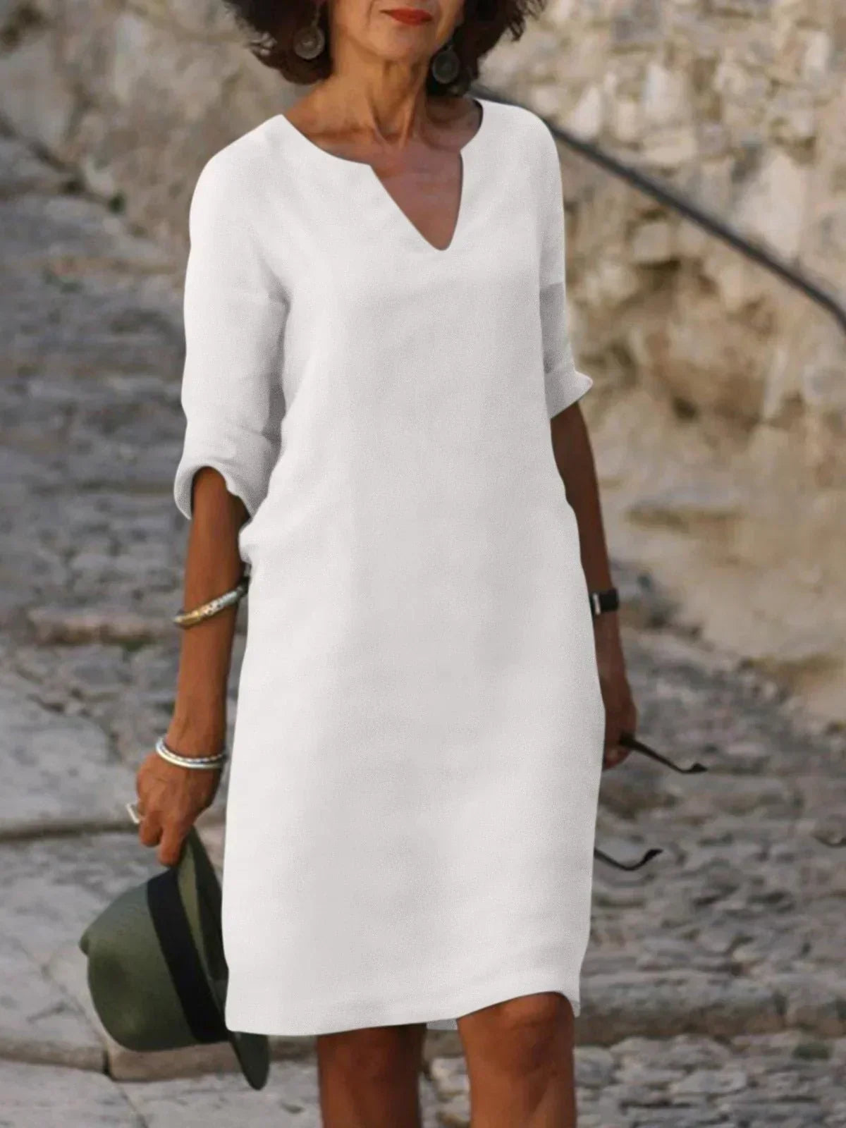 Elegant Skylar V-neck dress for women by Harrow, featuring a stylish summer design and flowing fabric.