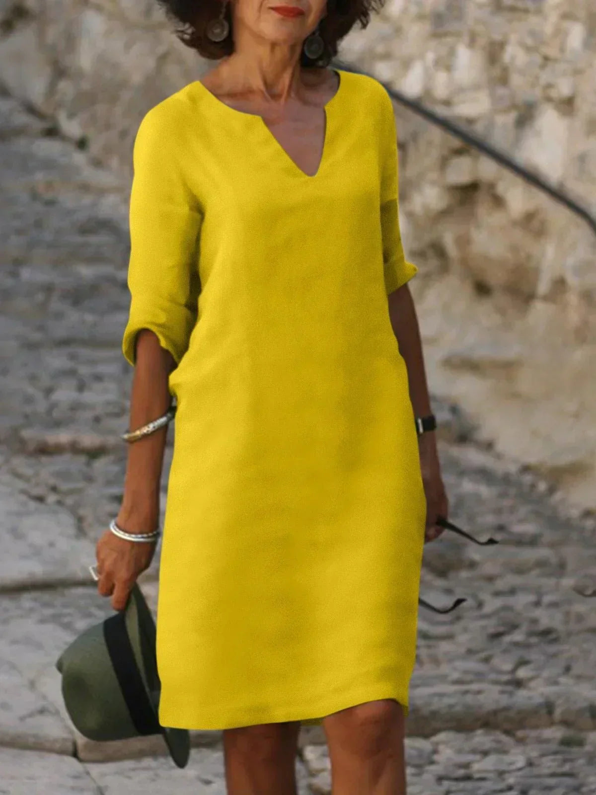 Elegant Skylar V-neck summer dress for women by Harrow, featuring a flowy design and lightweight fabric.