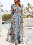Elegant V-neck midi dress for women by Harrow, featuring a flattering fit and stylish design, shown in a sleek, feminine silhouette.