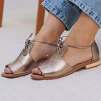 Harrow Stella metallic flat sandals for women with open toe, bow tie strap, perfect for summer footwear style.