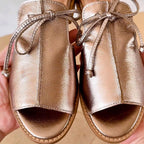 Harrow Stella women's metallic flat sandals with open toe, bow tie strap, perfect for summer footwear.