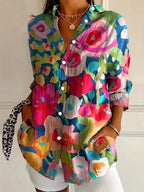 Vibrant floral linen blouse for women by Harrow, featuring a playful print and summer-ready lightweight fabric.