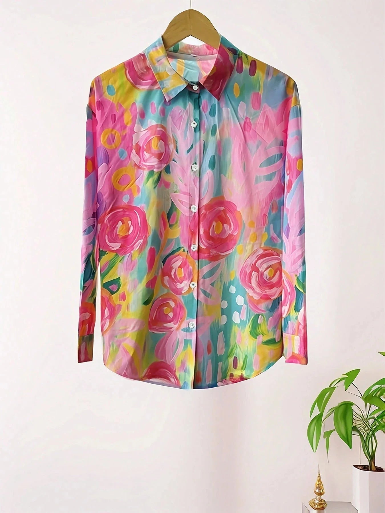 Vibrant floral linen blouse for women by Harrow, featuring a playful print and lightweight summer apparel design.