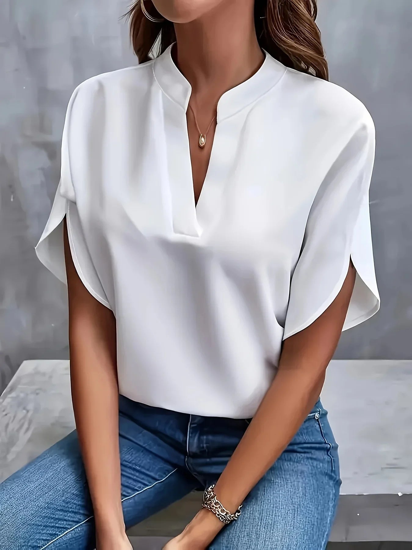 Harrow Thalia cropped linen blouse for women, featuring a lightweight summer design with a sophisticated, relaxed fit.