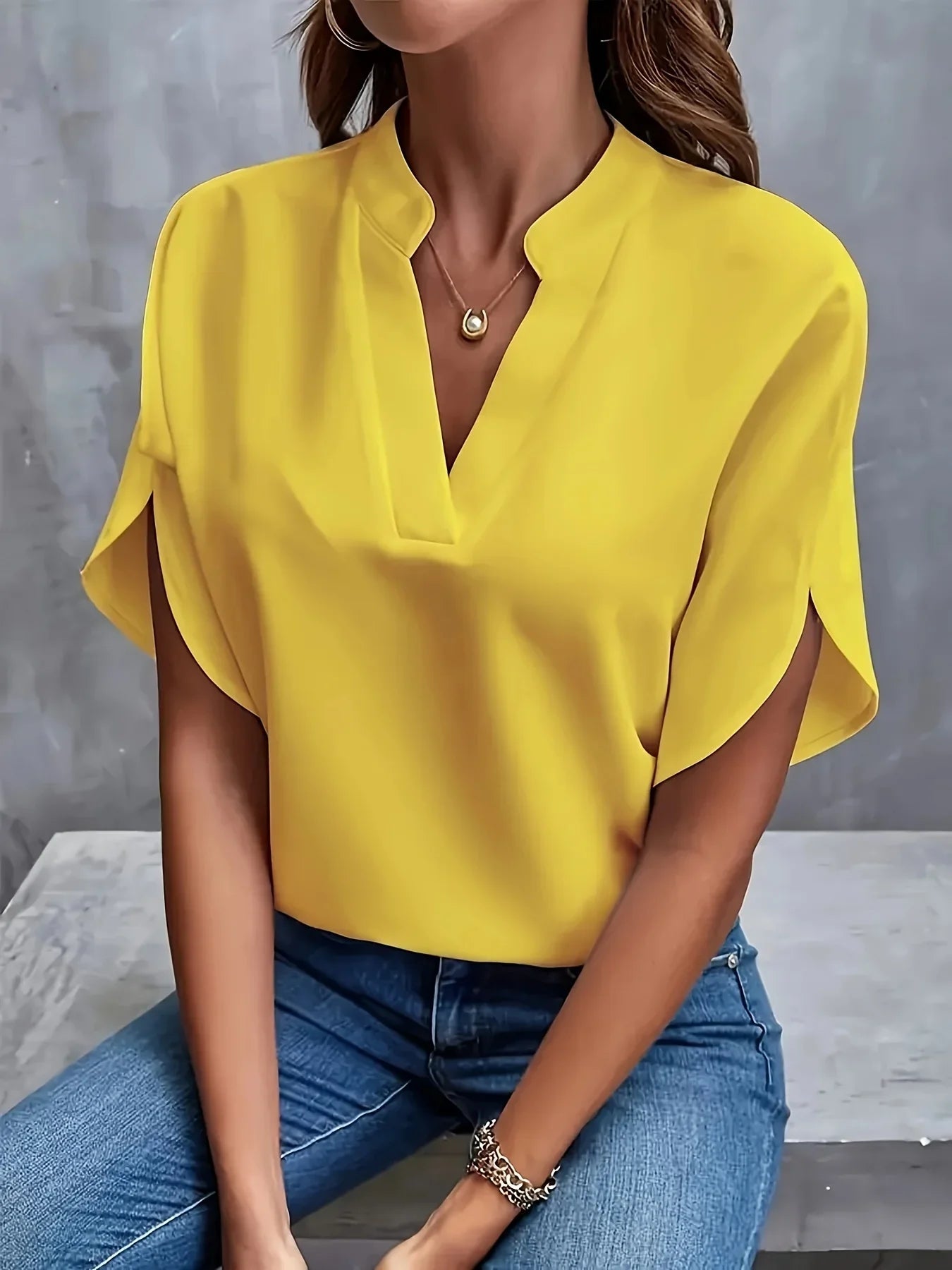 Harrow Thalia cropped linen blouse for women, featuring a lightweight, sophisticated summer apparel design with short sleeves.