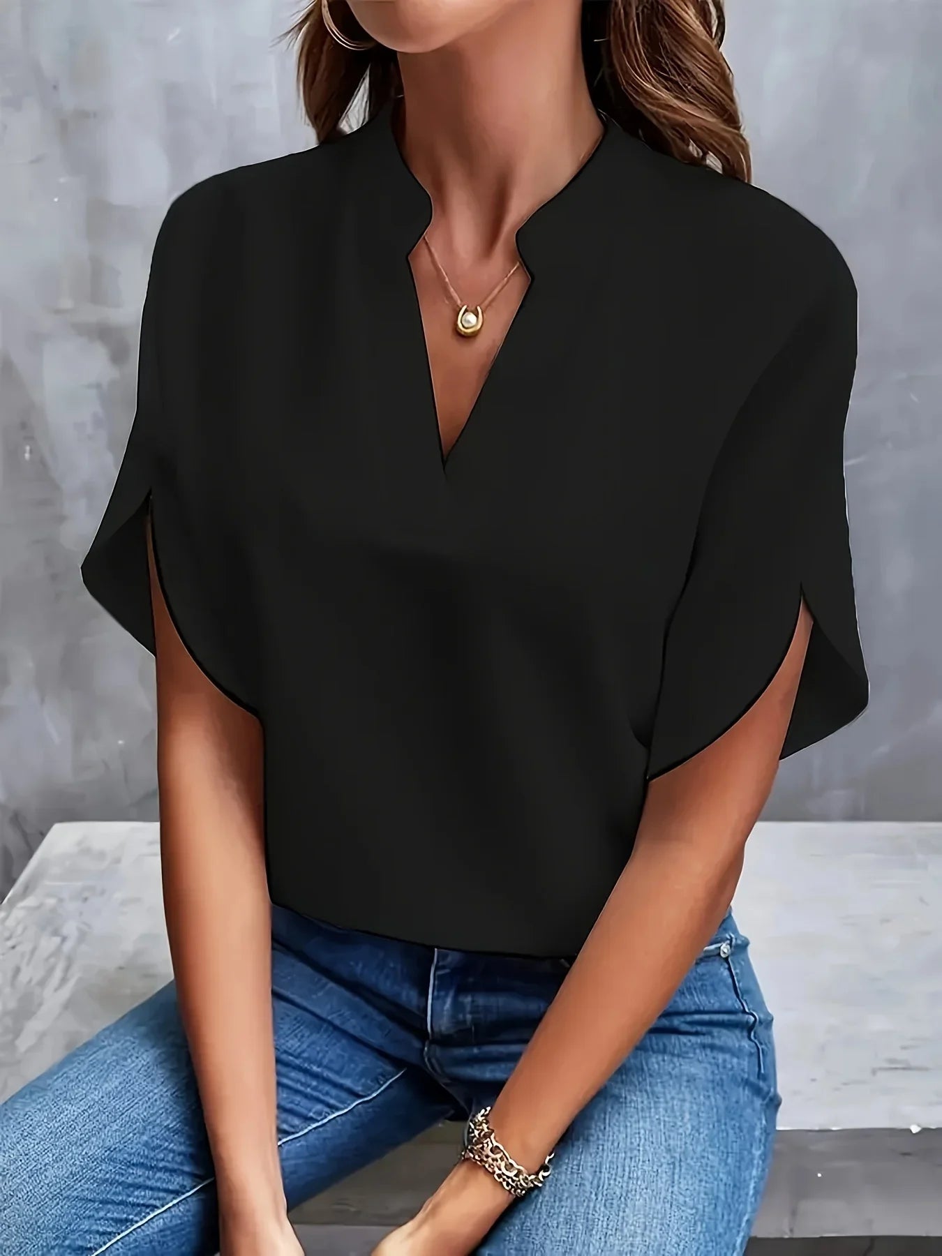 Harrow Thalia cropped linen blouse for women, lightweight summer apparel with a relaxed fit and sophisticated style.
