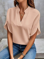 Harrow Thalia cropped linen blouse for women, featuring a stylish summer apparel design with short sleeves and a relaxed fit.