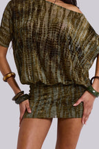 Women wearing the Adriana romantic off-shoulder mini dress by Harrow, featuring a backless design perfect for cocktail parties.