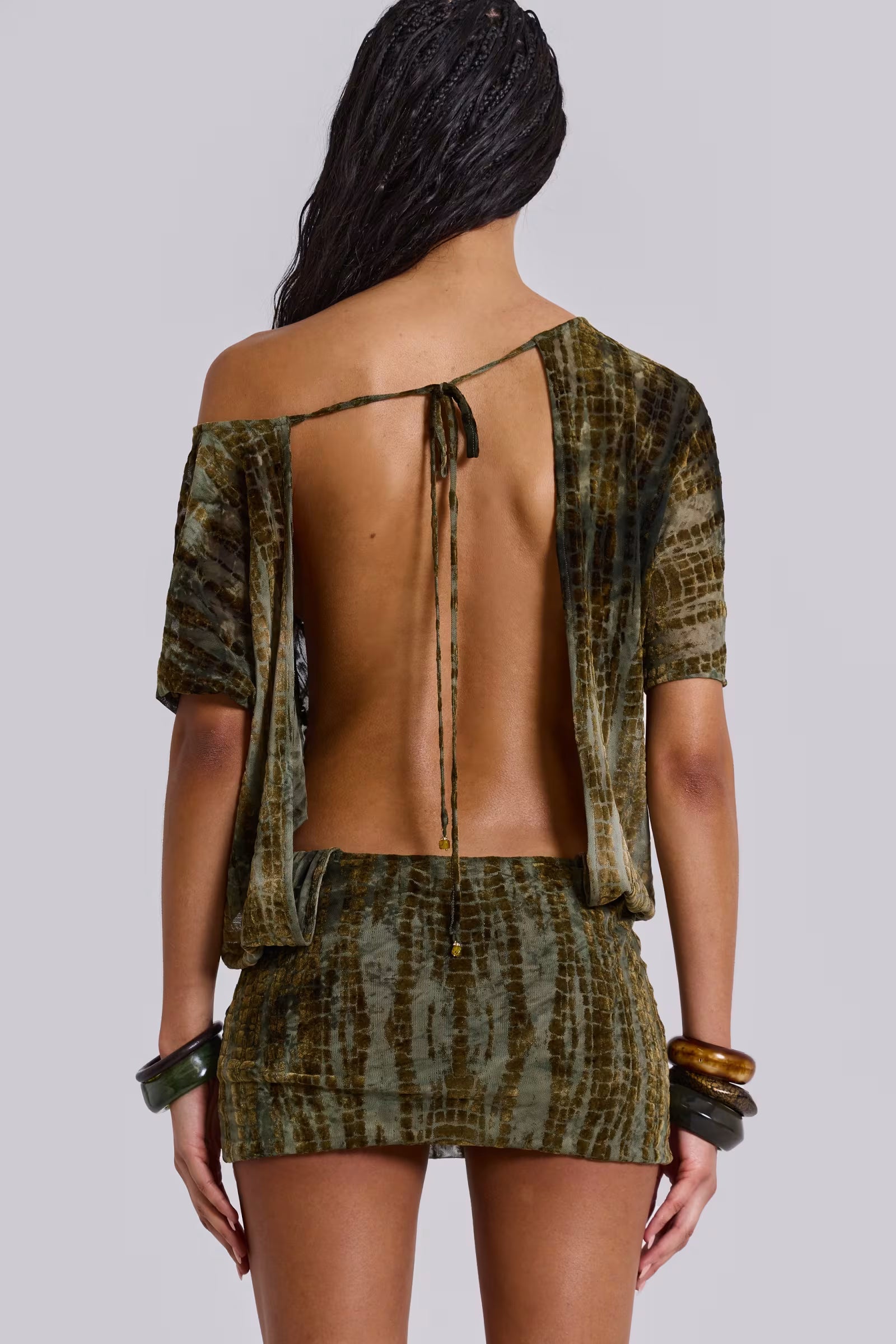 Women wearing the Adriana off-shoulder mini dress by Harrow, backless and romantic for cocktail parties.