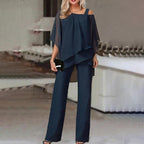 Women wearing the Agnes cold shoulder wide-leg jumpsuit set by Harrow, featuring batwing sleeves and stylish design.
