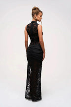 Women wearing the Harrow Ainsley lace maxi dress with floral design and high slit, perfect for cocktail parties.