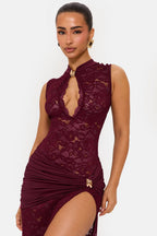 Women wearing Harrow Ainsley lace maxi dress with floral pattern and high slit, ideal for cocktail parties.