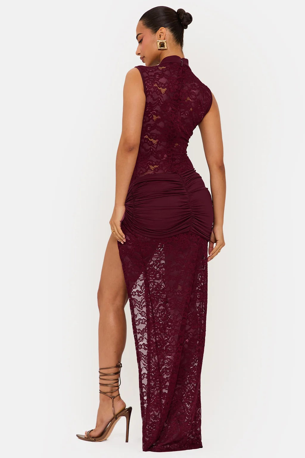 Women wearing Harrow Ainsley elegant lace maxi dress with floral details and high slit, perfect for cocktail parties.
